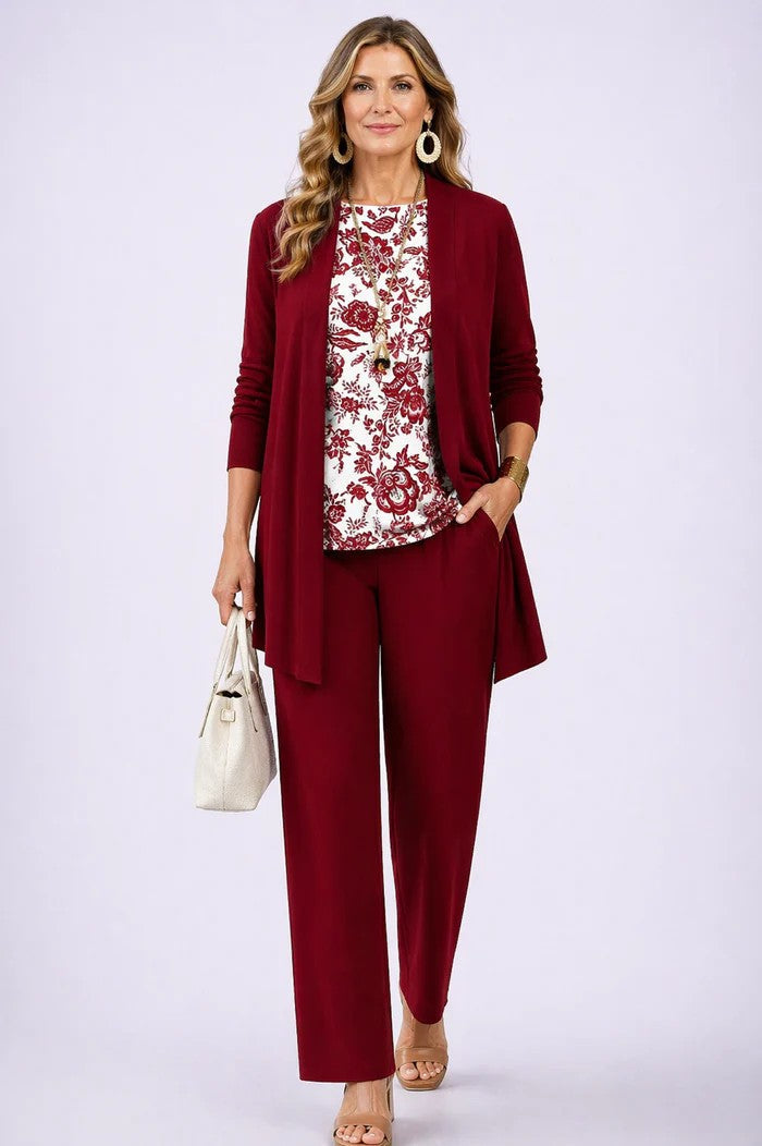 Burgundy open cardigan and pants with a white and red floral print top