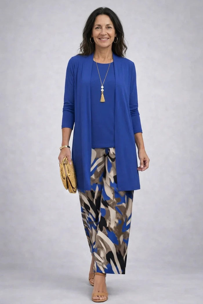 Royal blue cardigan and top worn with abstract brushstroke print pants