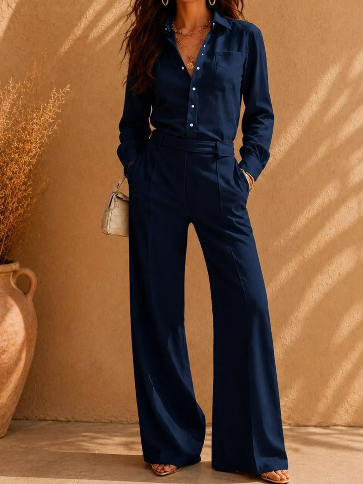 Navy button front shirt paired with matching high waist wide pants
