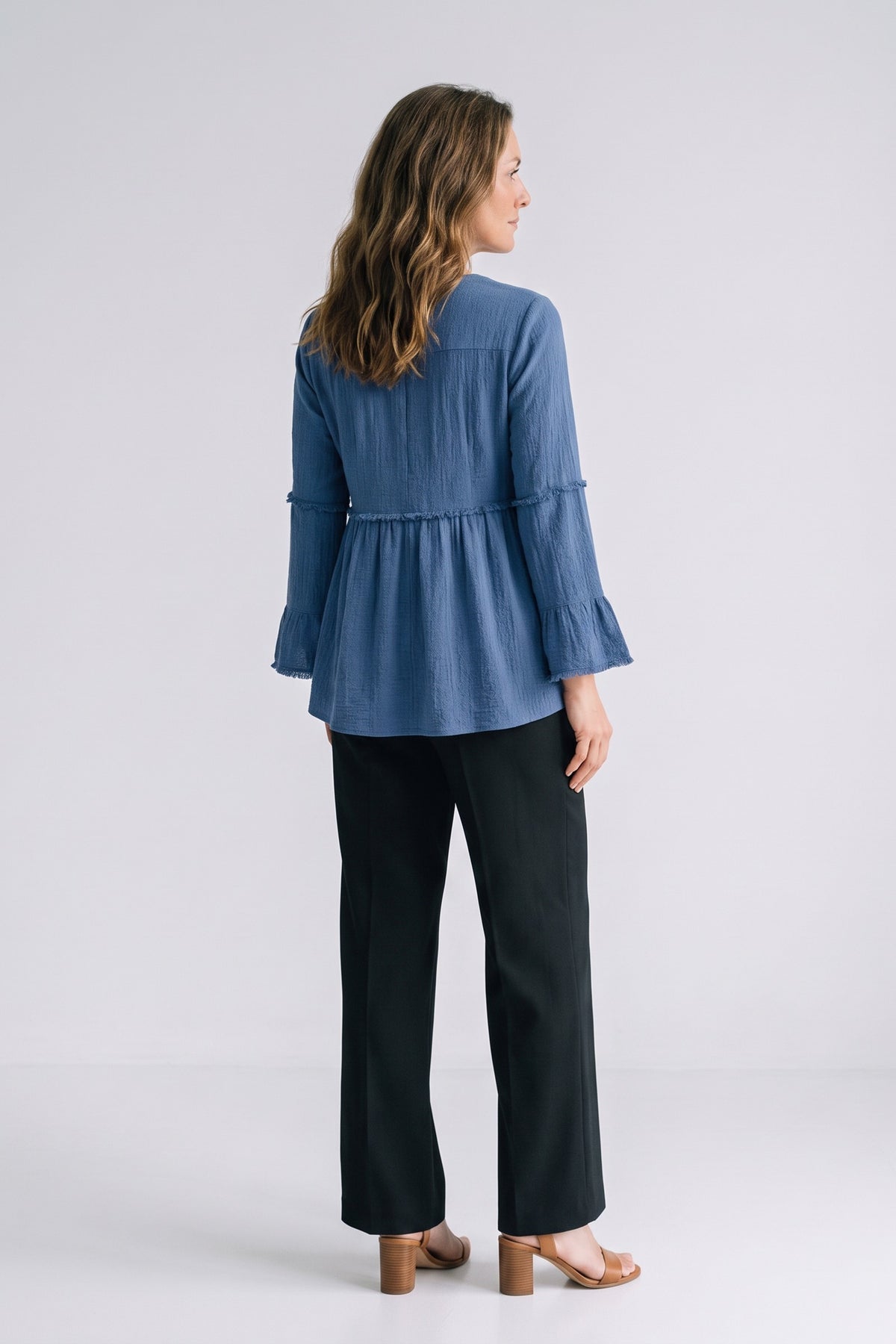 Women's Peplum Blouse | Ruffle Sleeves — Blue — back view — on model