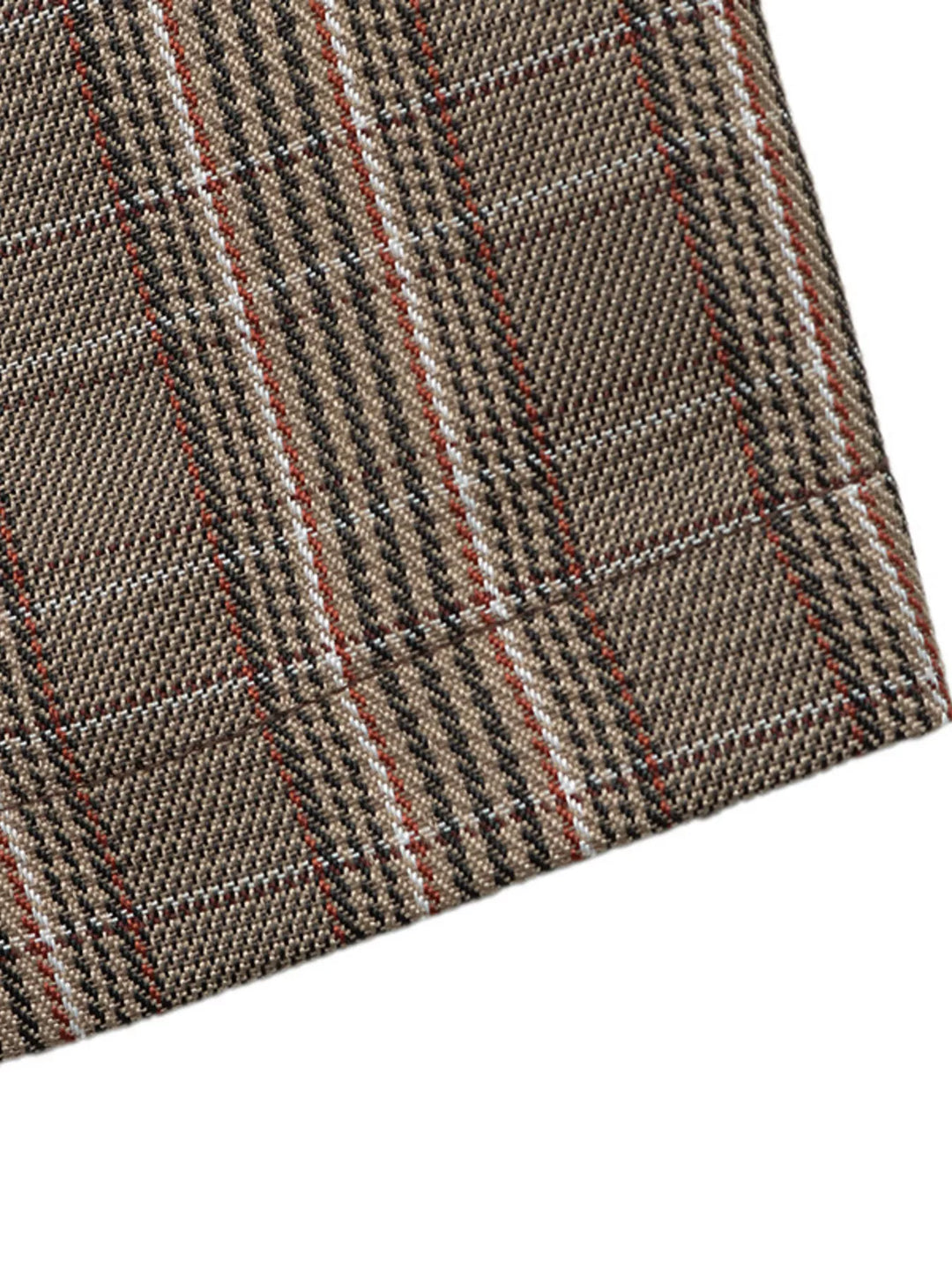 Plaid blazer sleeve hem corner showing the glen weave pattern