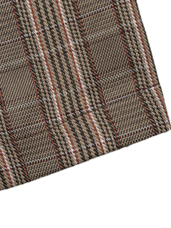 Plaid blazer sleeve hem corner showing the glen weave pattern