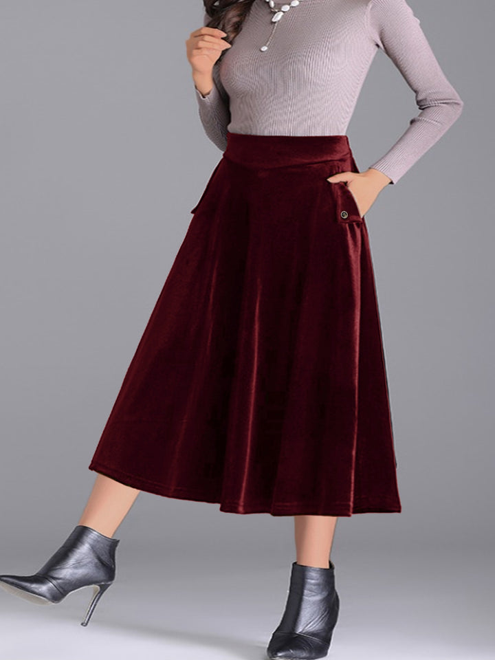 Burgundy A line midi skirt with hand in pocket and heeled ankle boots