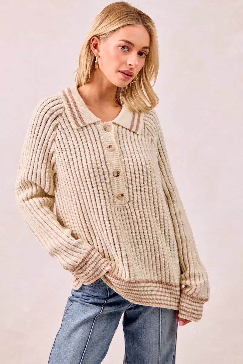 Cream latte half button sweater with collar worn with relaxed posture