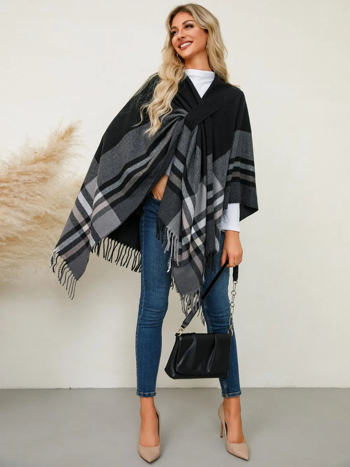 Plaid fringe hem open front in black, styled on model 2