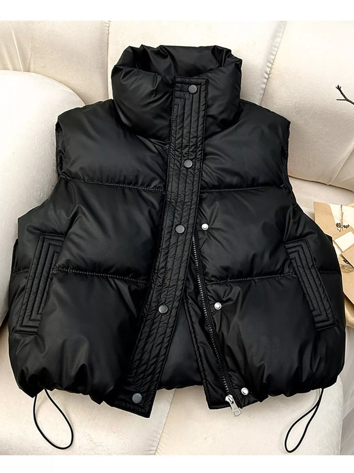 Women's puffer vest in black, cropped quilted stand collar drawstring hem