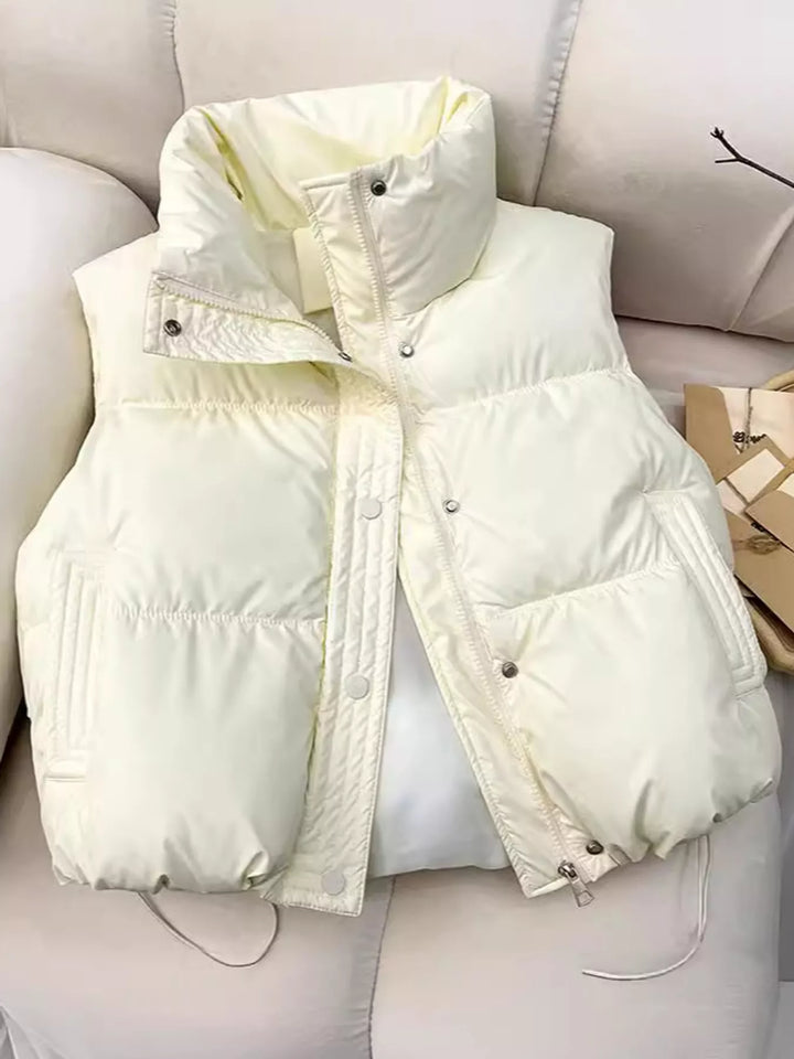 Cropped quilted stand collar drawstring hem in white, styled on model