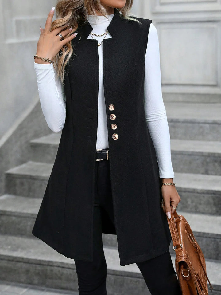 Longline stand collar button side pockets in black, styled on model 2