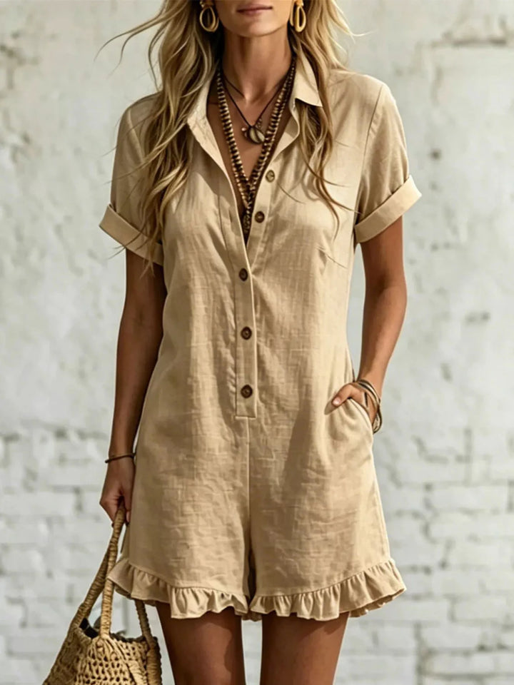 Khaki short sleeve romper with a collar, buttons and ruffle hem