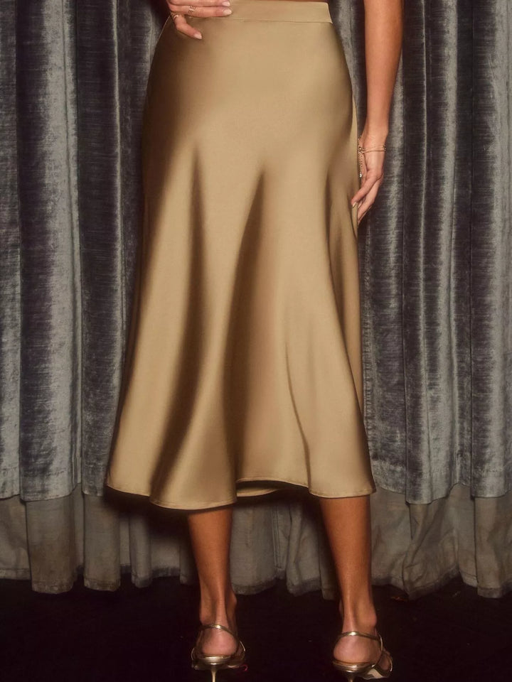 Gold high waisted midi skirt, full length view showing the flared hem