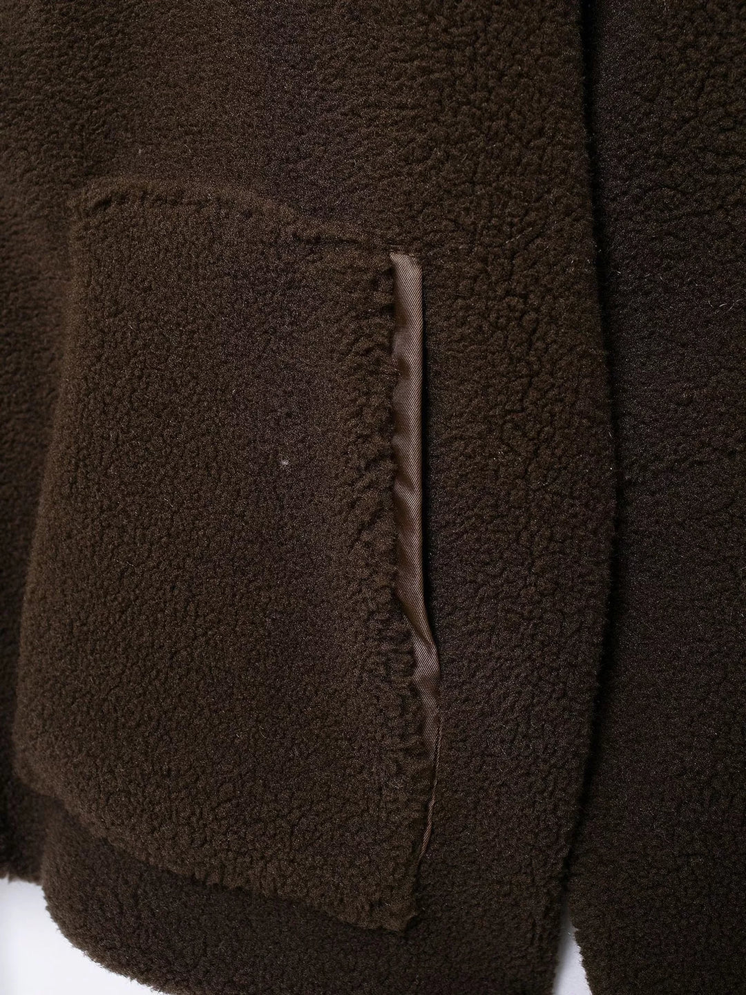 Stand collar full zip drawcord hem in coffee-ribbed, close-up detail