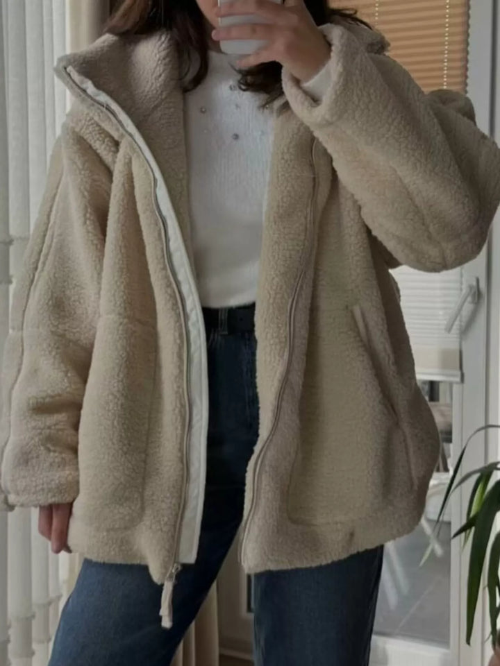 Stand collar full zip drawcord hem in khaki, styled on model