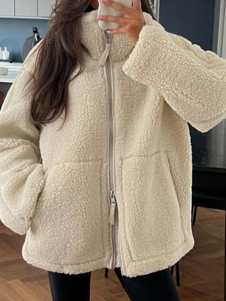 Women's sherpa-look jacket in off white, stand collar full zip drawcord hem