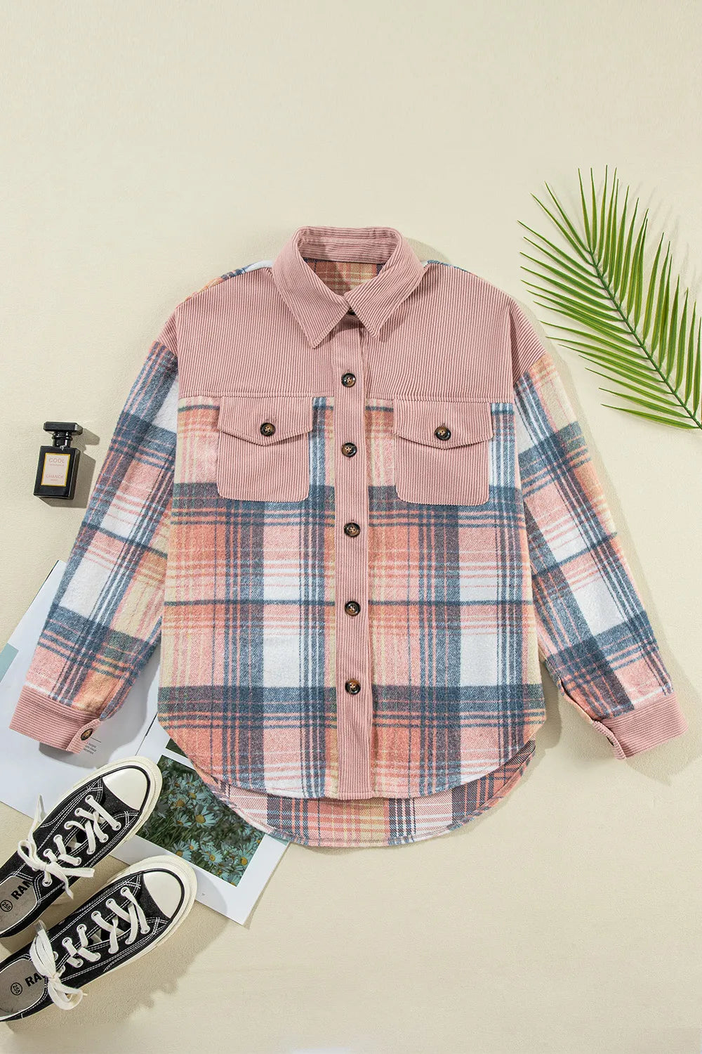 Flat lay of the blush plaid button up shacket with two chest pockets