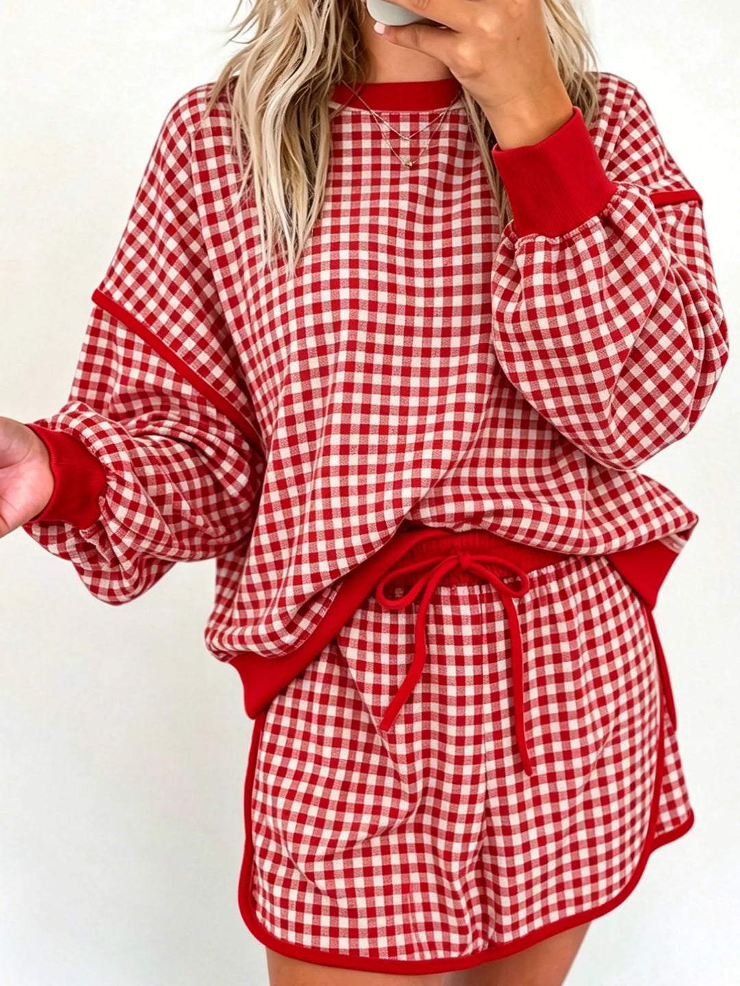 Women's red gingham shorts set with sweatshirt and drawstring shorts, front view