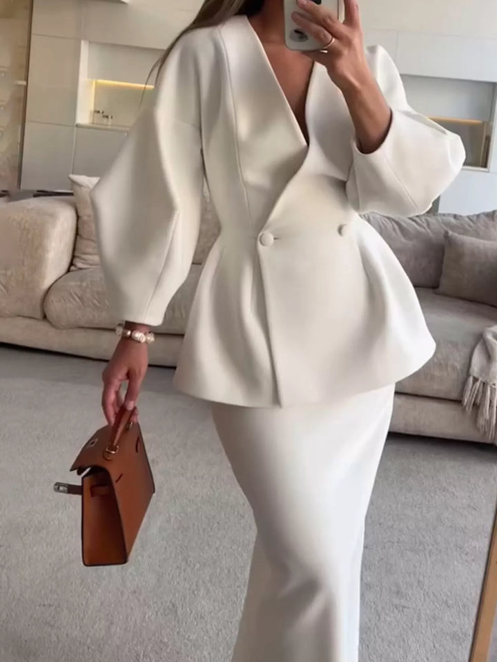 Women's skirt suit in white with peplum blazer and midi pencil skirt