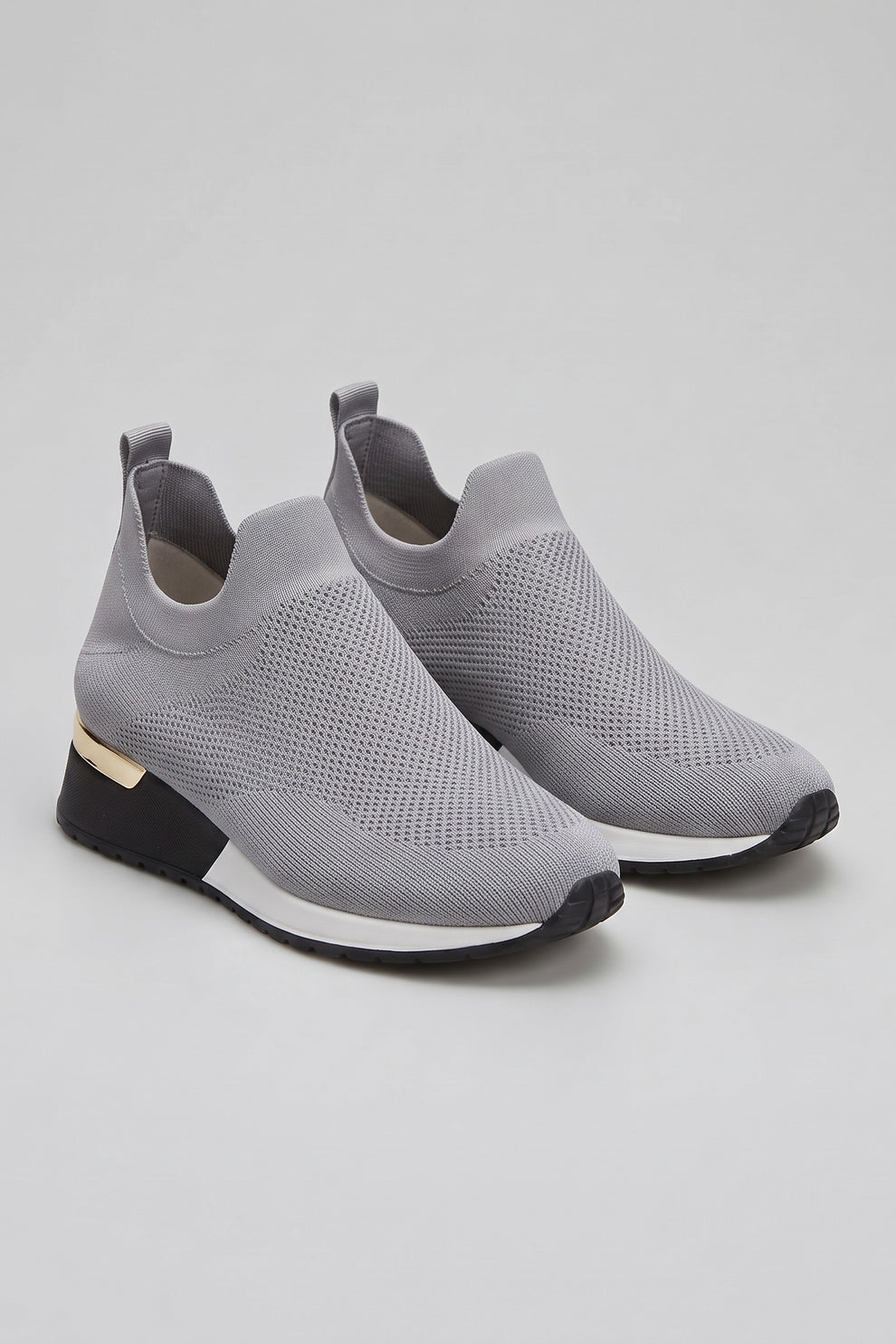 Women's Slip-On Sneakers | Metallic Heel — Light Grey — shoe_main — on model