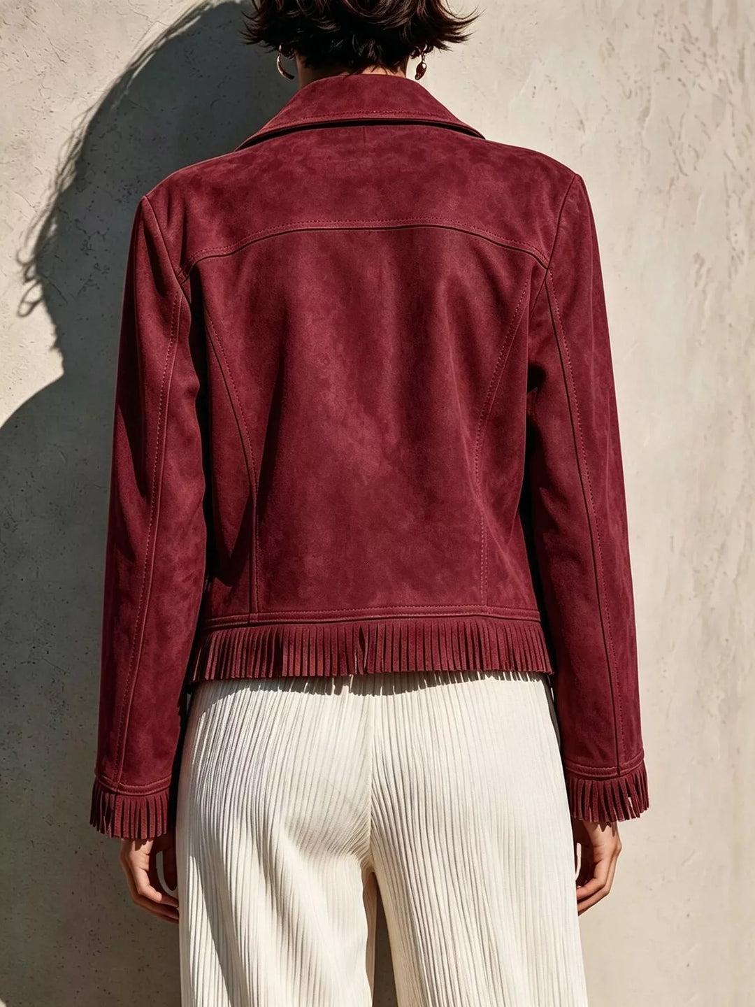 Cropped moto fringe hem asymmetric zip in burgundy, back view
