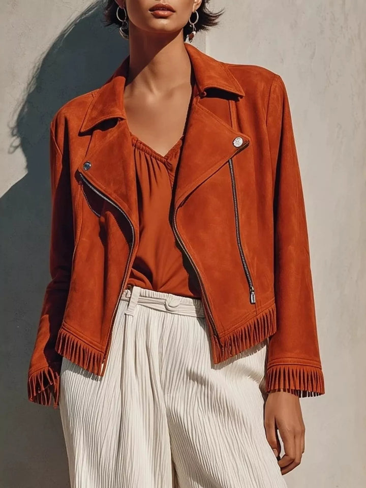 Cropped moto fringe hem asymmetric zip in rust, front view