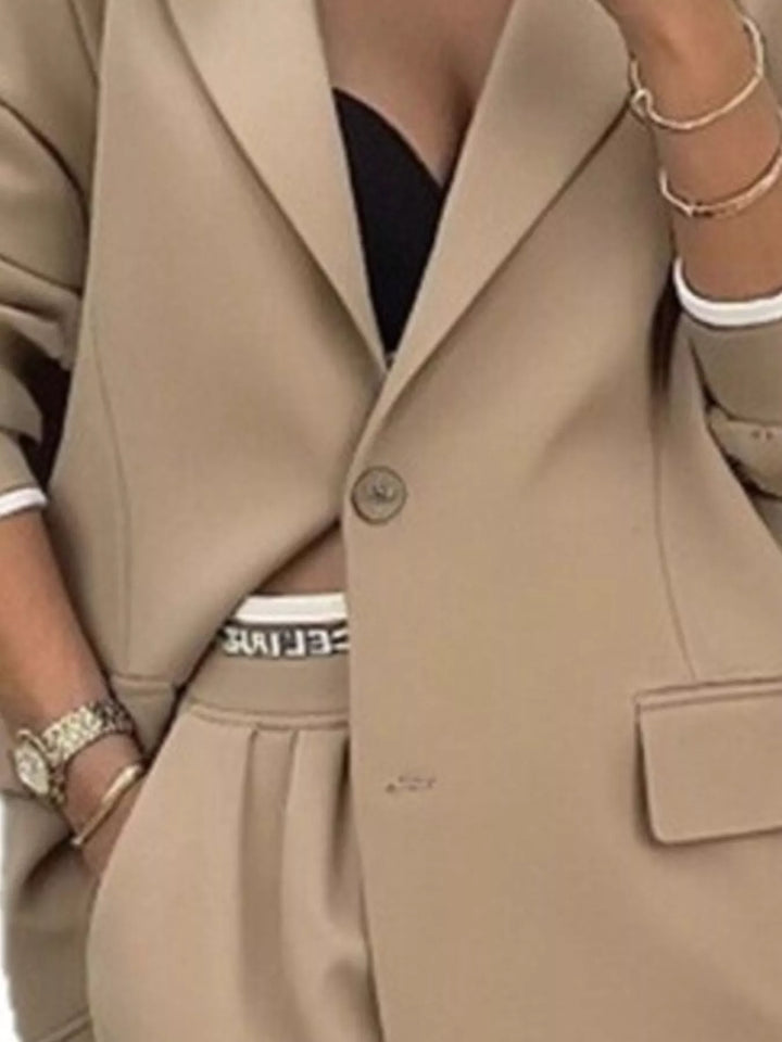 Oversized one button blazer and wide leg pants in khaki, close-up detail