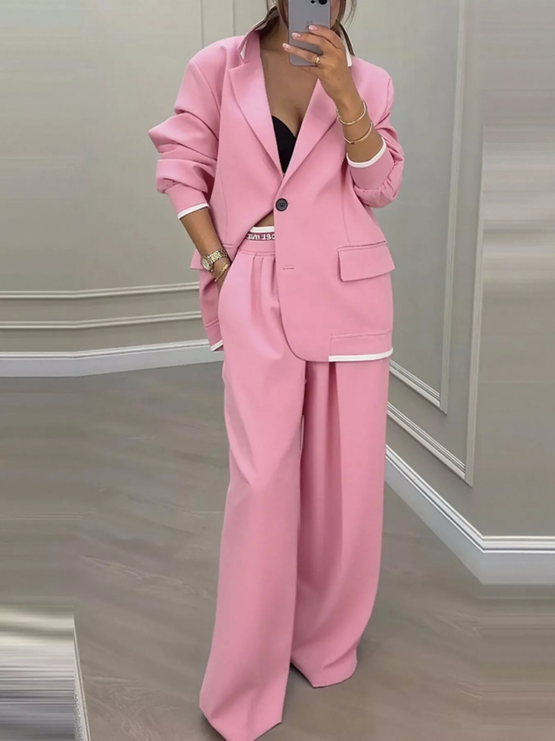 Oversized one button blazer and wide leg pants in pink, front view