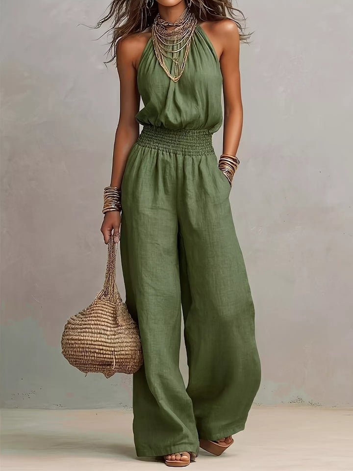 Olive halter neck jumpsuit with wide leg, full length front view