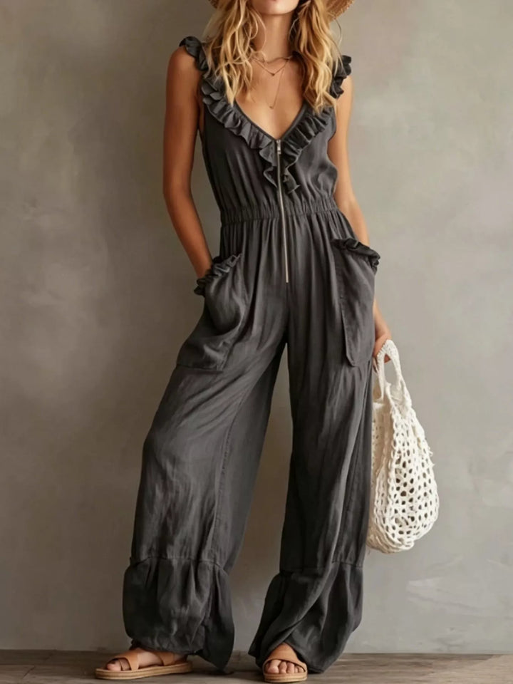 Charcoal sleeveless ruffle V neck jumpsuit with wide legs, front view