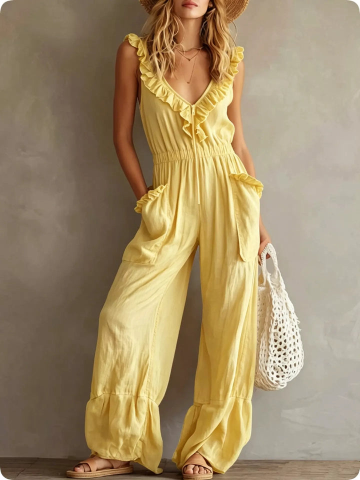 Yellow sleeveless jumpsuit with ruffle neckline, wide leg full length