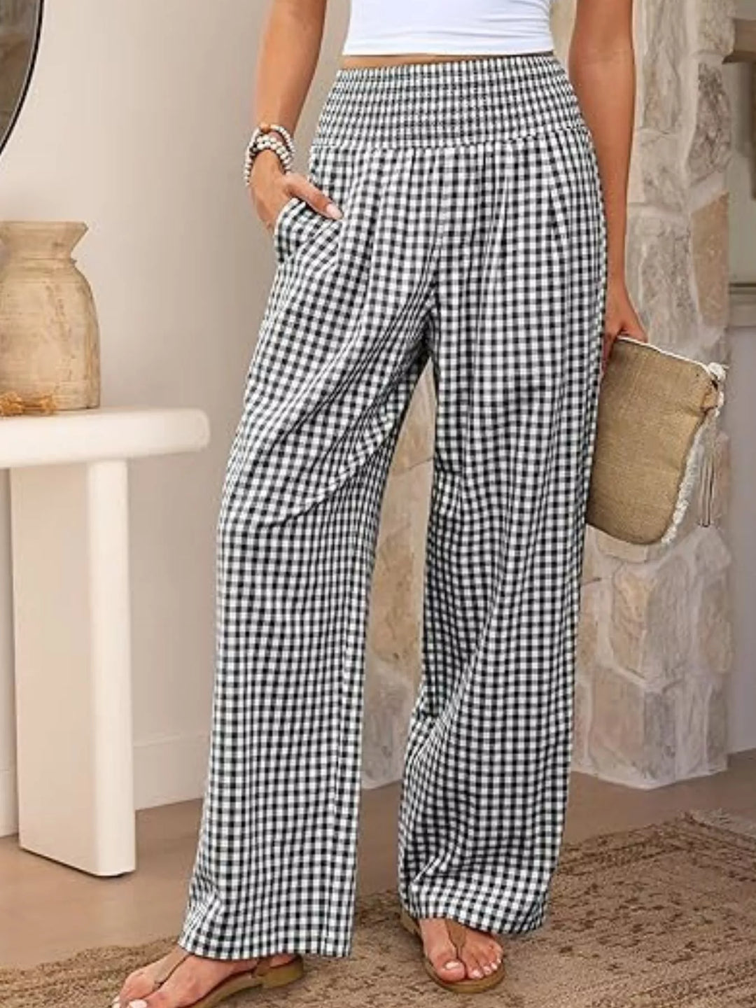 Women's summer pants in black gingham, wide leg with smocked high waist, front view