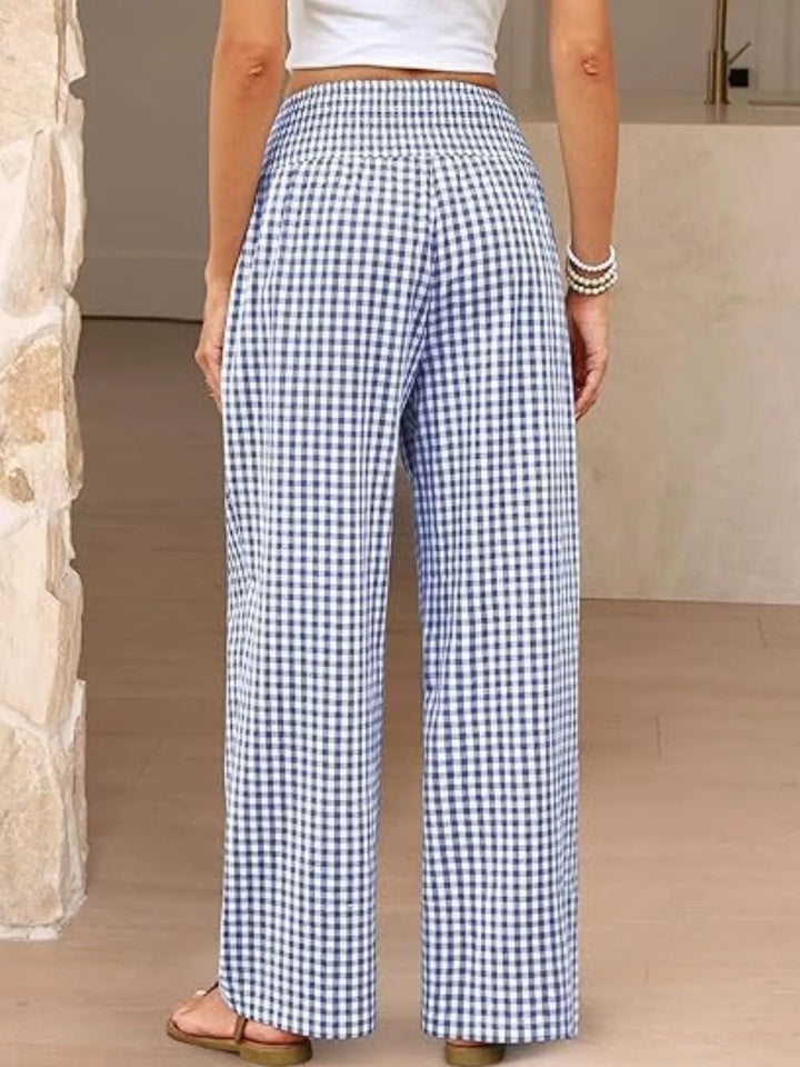 Back view of the blue gingham wide leg pants with smocked waist