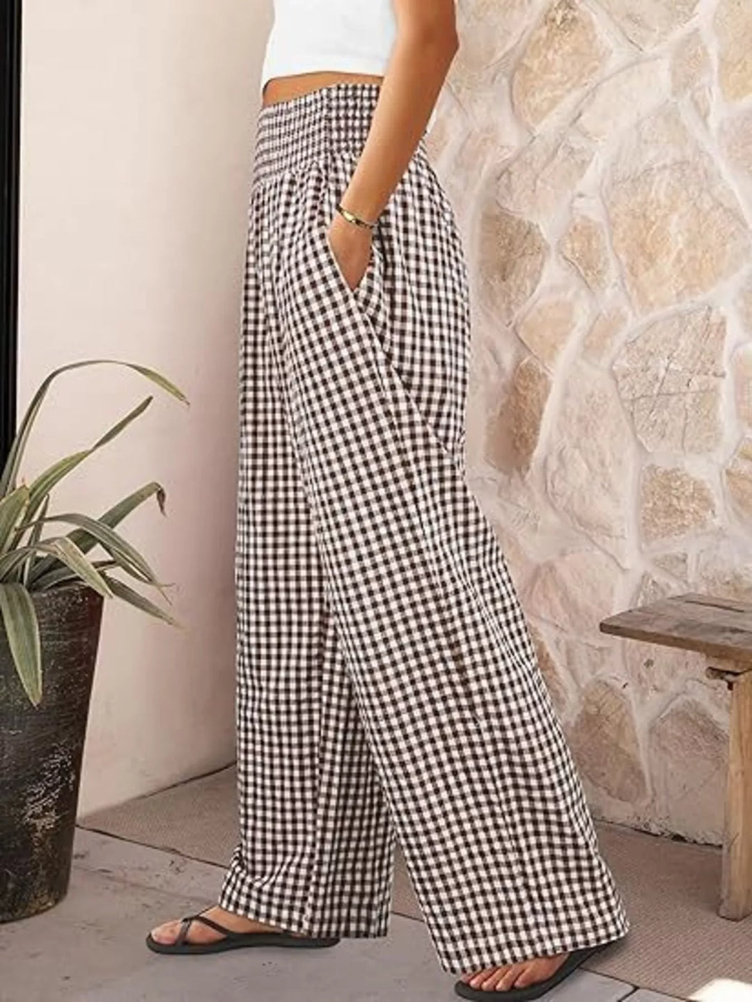 Brown gingham summer pants in side view with sandals