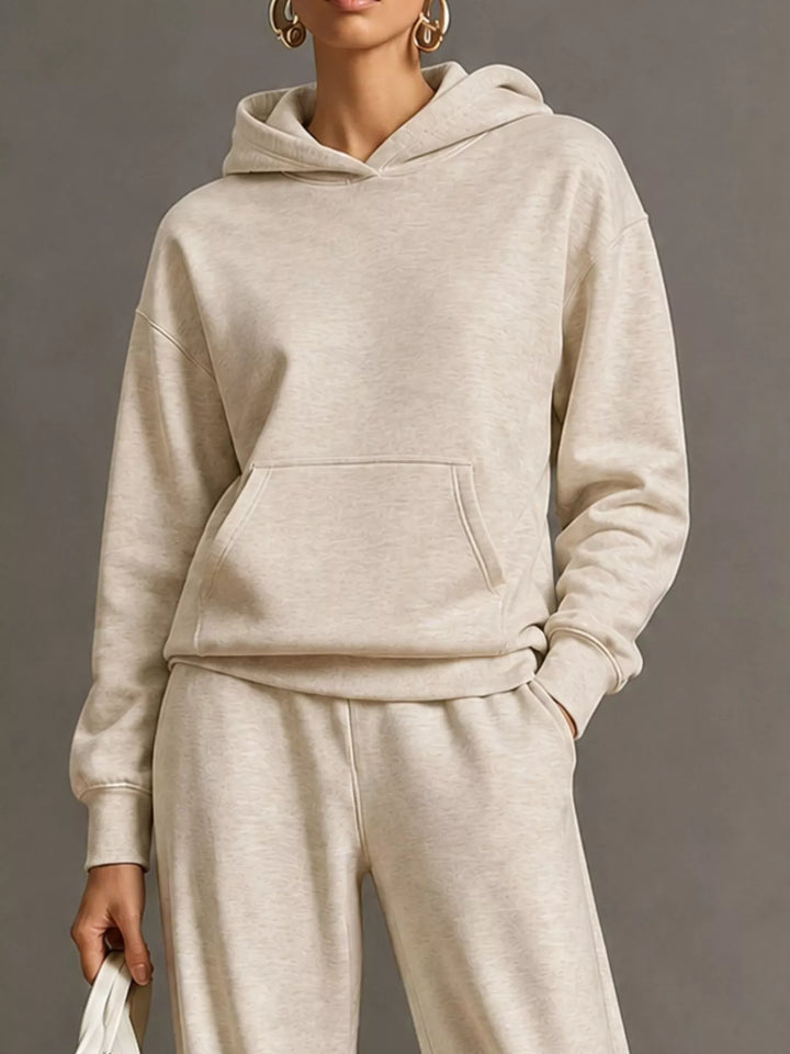 Kangaroo pocket hoodie and wide leg pants in beige, close-up detail