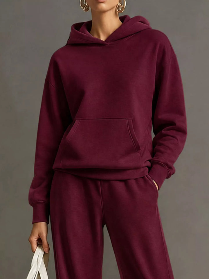 Kangaroo pocket hoodie and wide leg pants in burgundy, close-up detail