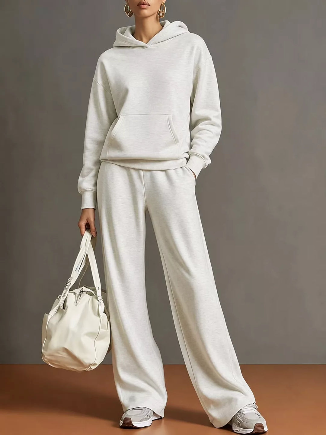 Kangaroo pocket hoodie and wide leg pants in white, front view