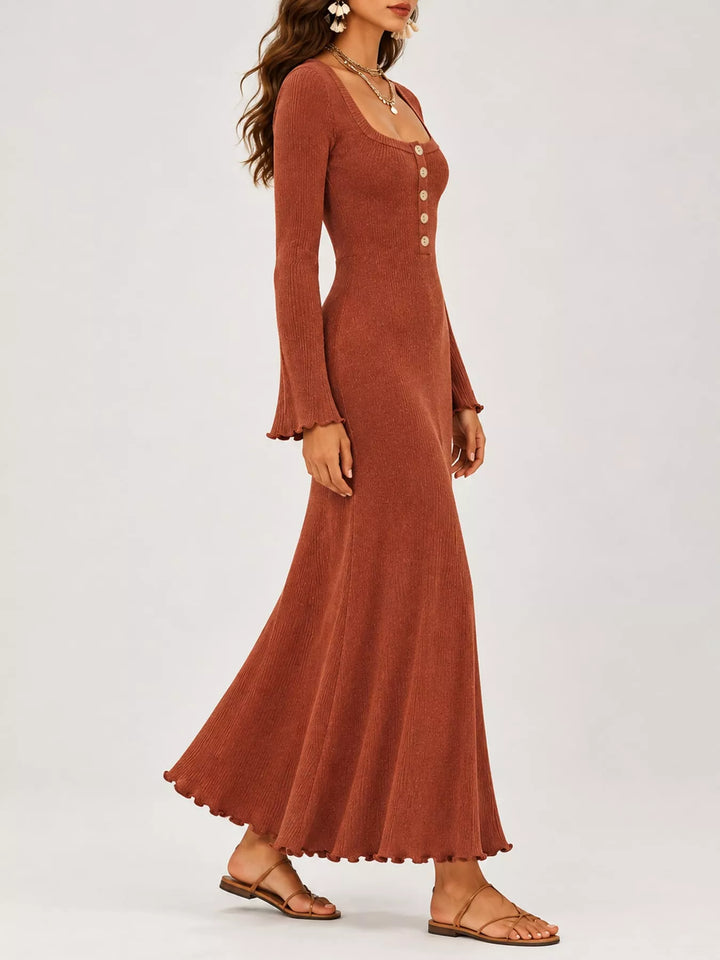 Coral sweater dress worn on a model, showing the ribbed knit look