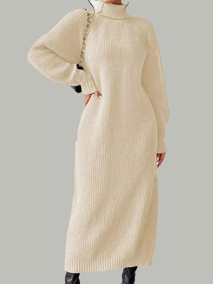 Apricot sweater dress worn on a model, showing the turtleneck