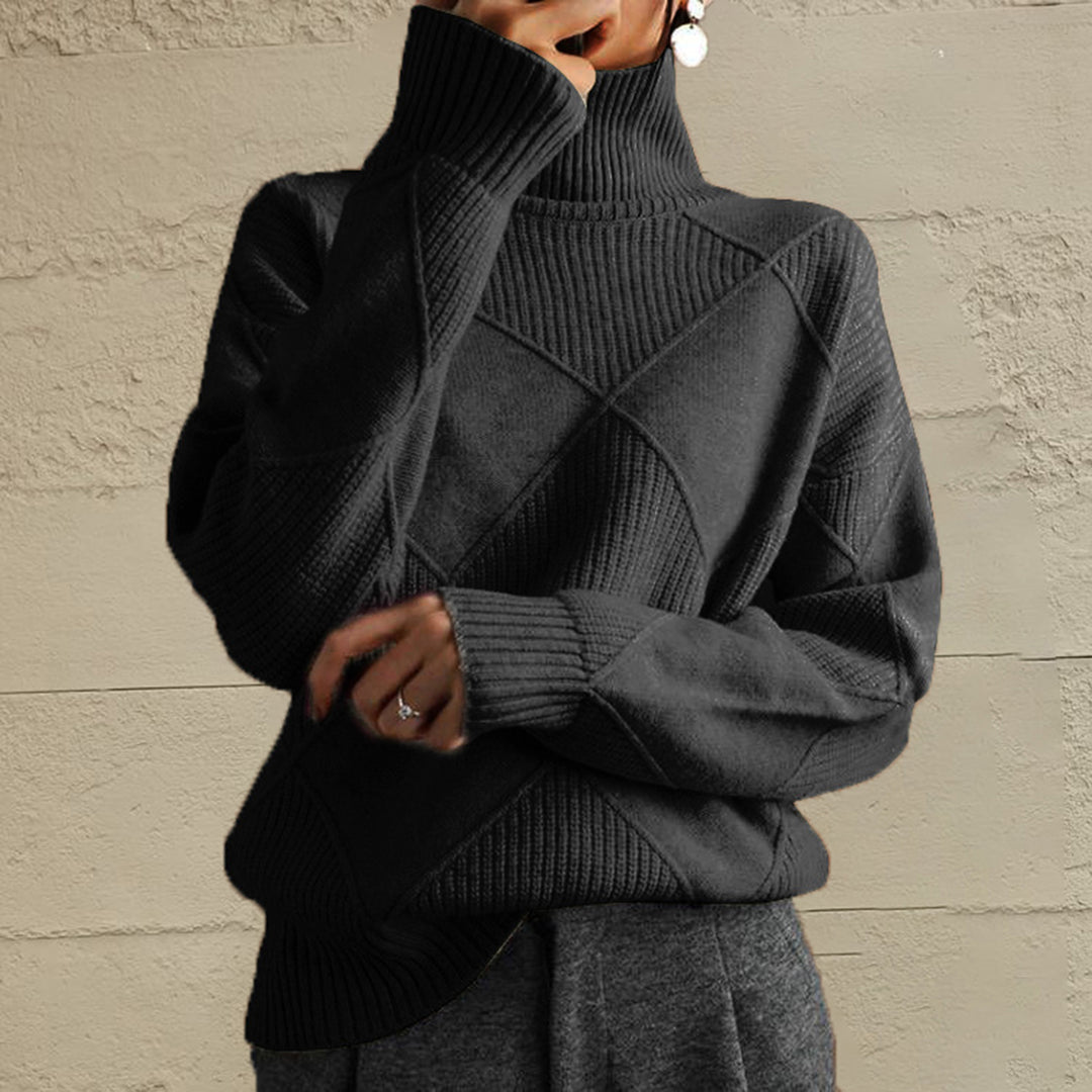 Charcoal oversized turtleneck sweater with a geometric diamond knit, front view