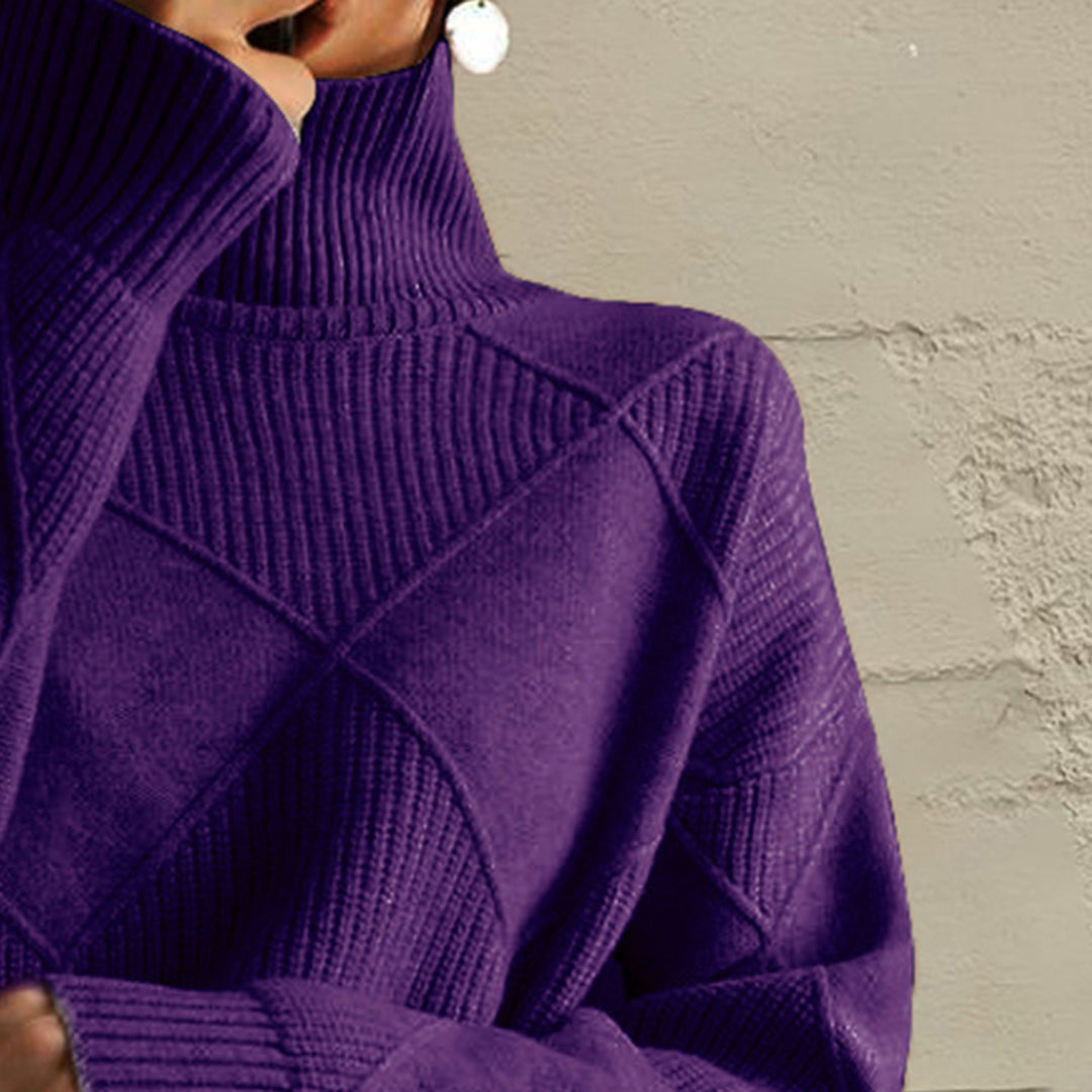 Close-up of the deep purple turtleneck collar and diamond knit pattern