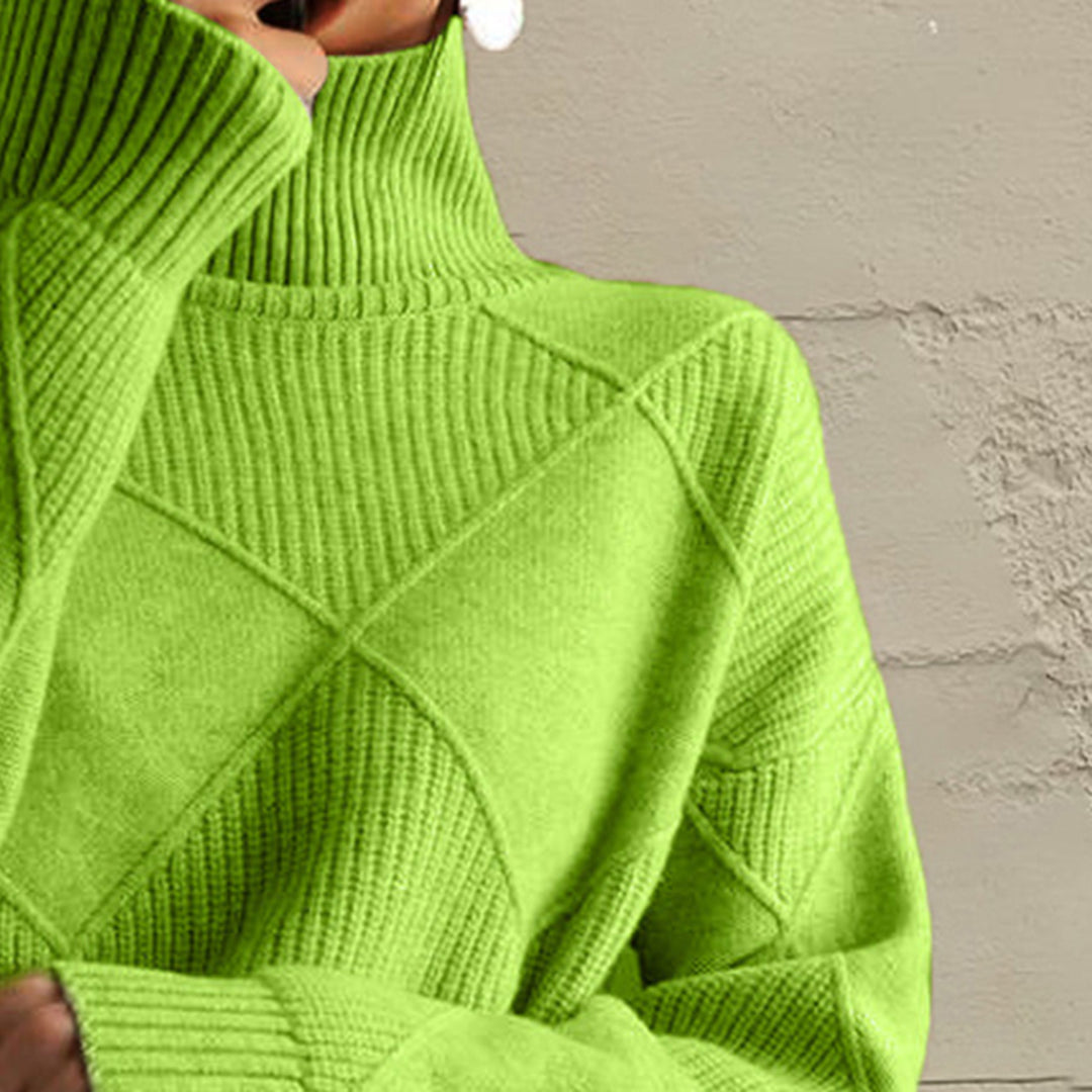 Close-up of the lime green turtleneck collar and diamond knit pattern