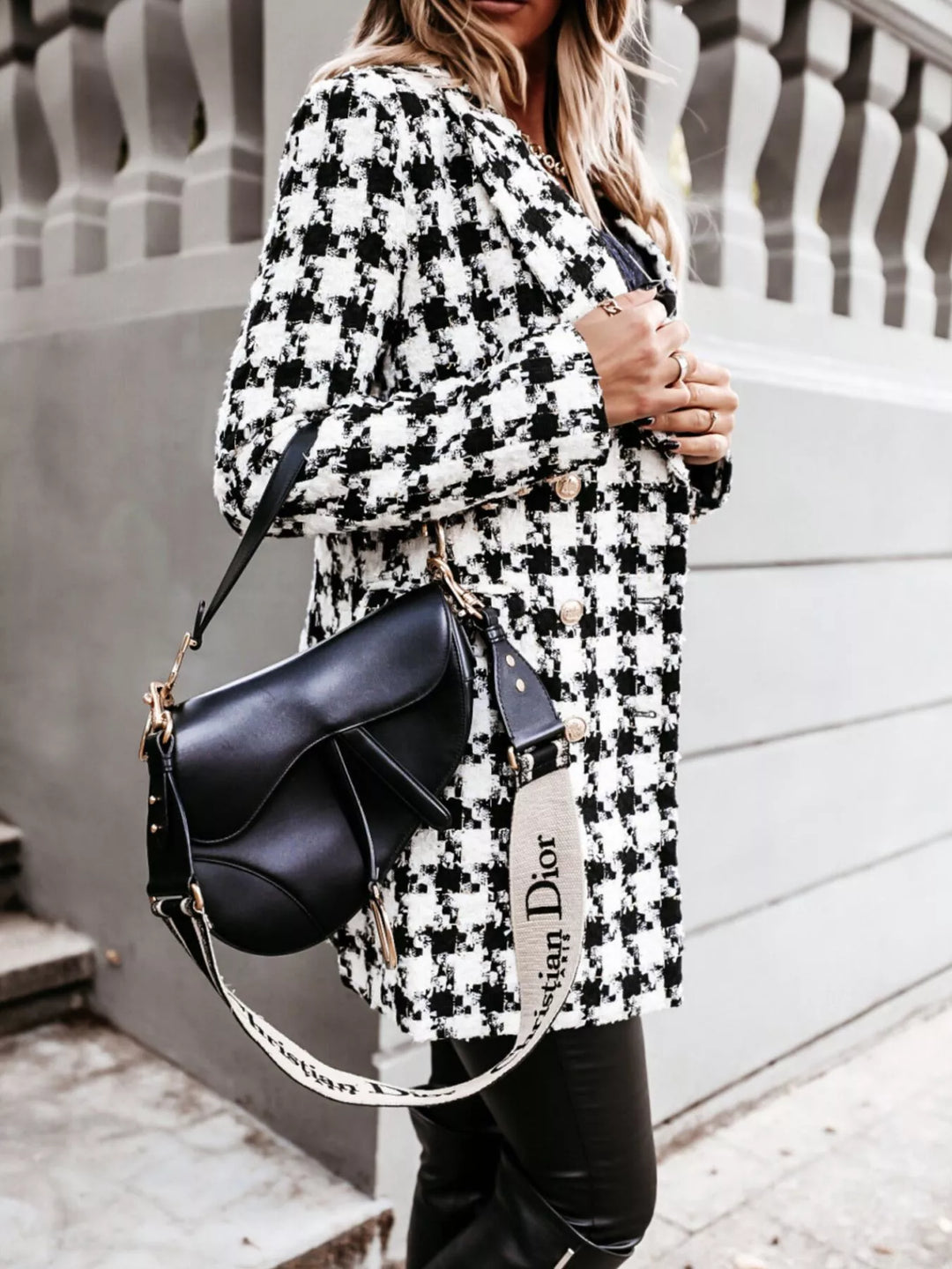 Houndstooth tweed coat styled with a black saddle bag