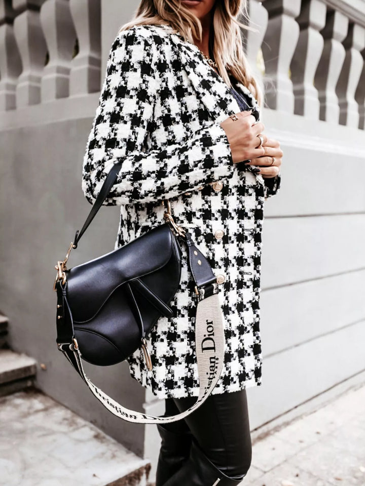 Houndstooth tweed coat styled with a black saddle bag