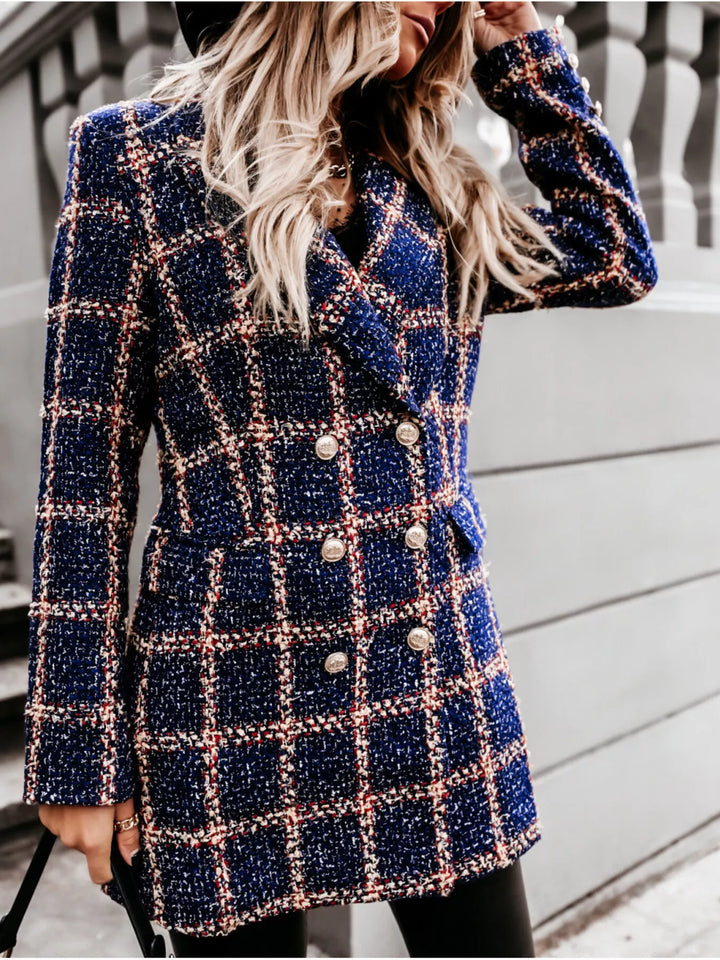 Navy plaid double breasted blazer coat, front view with raised hand