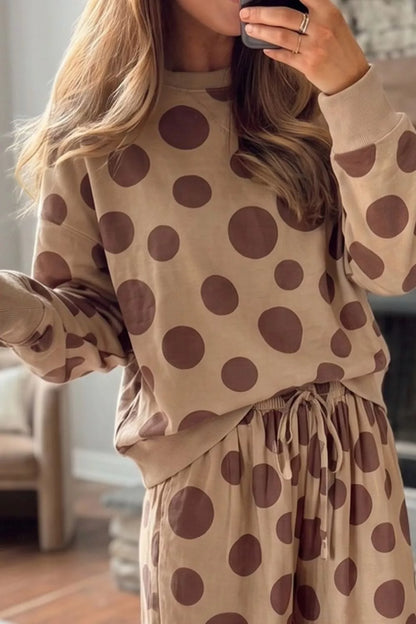 Tan polka dot lounge top and drawstring pants, close-up of the dot print