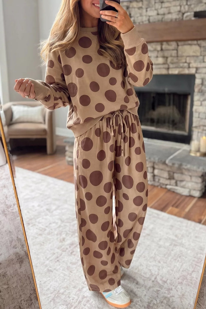 Women's tan two piece lounge set with polka dot top and wide leg pants