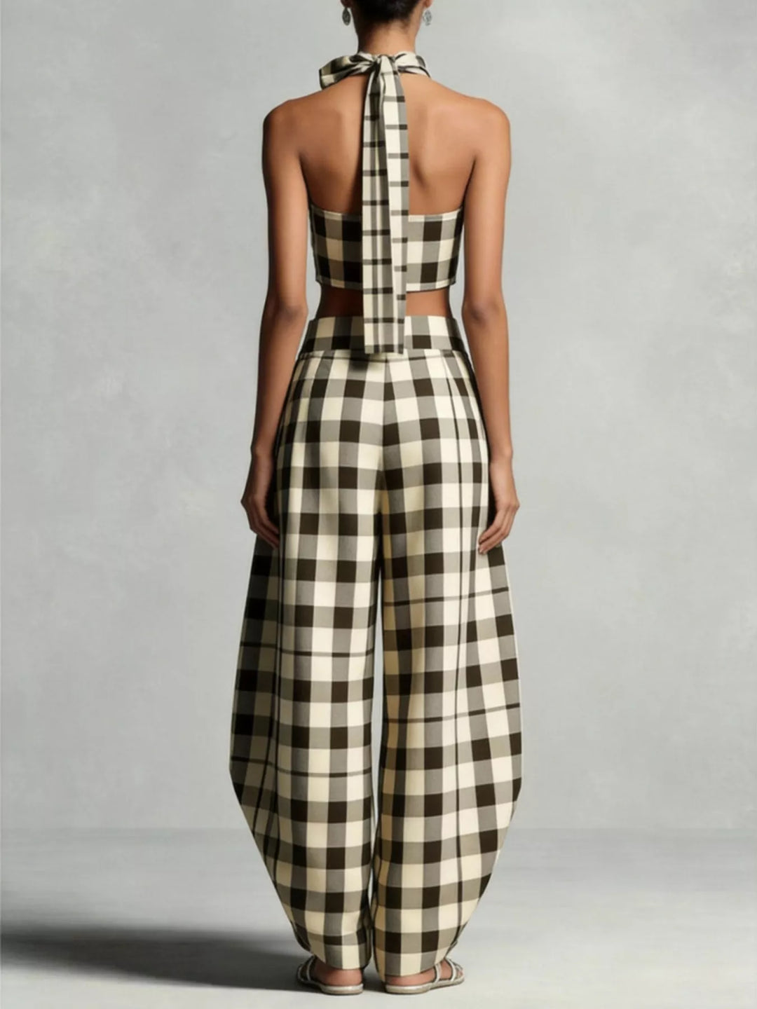 Back view of the plaid halter top with tie neck and barrel pants