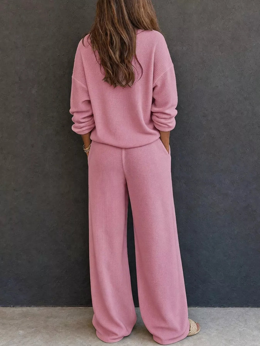 Back view of the dusty pink waffle knit henley and wide leg pants set