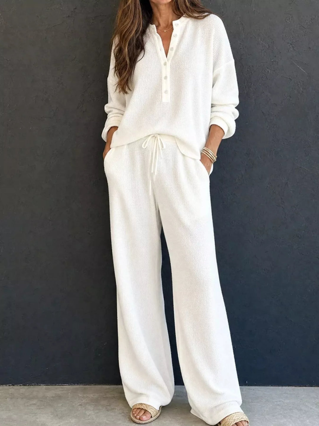 Women's white two piece set with waffle knit henley and wide leg pants, full view