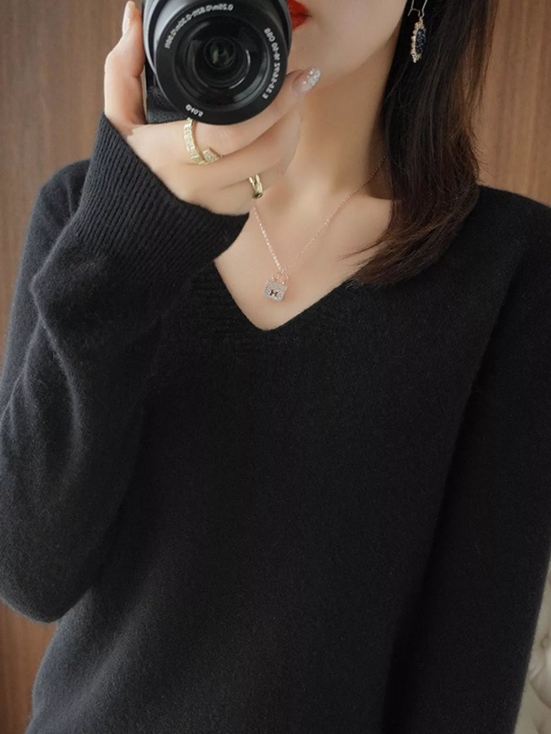 V neck sweater in black, on-model front view with long sleeves