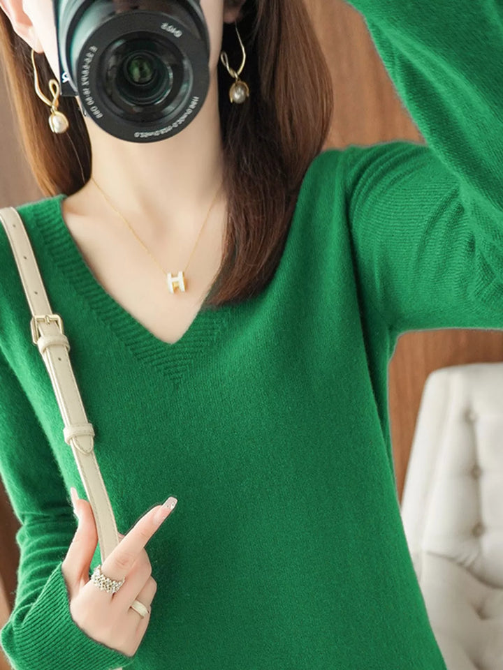 V neck sweater in emerald green, on-model front view with long sleeves