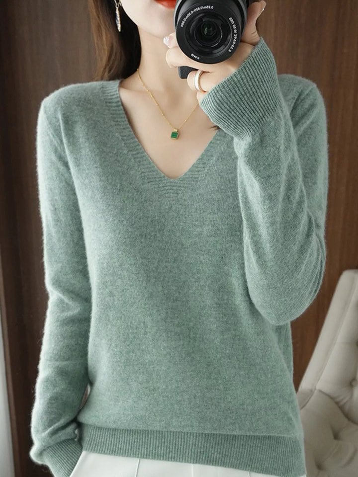 V neck sweater in leaf green, on-model front view with long sleeves